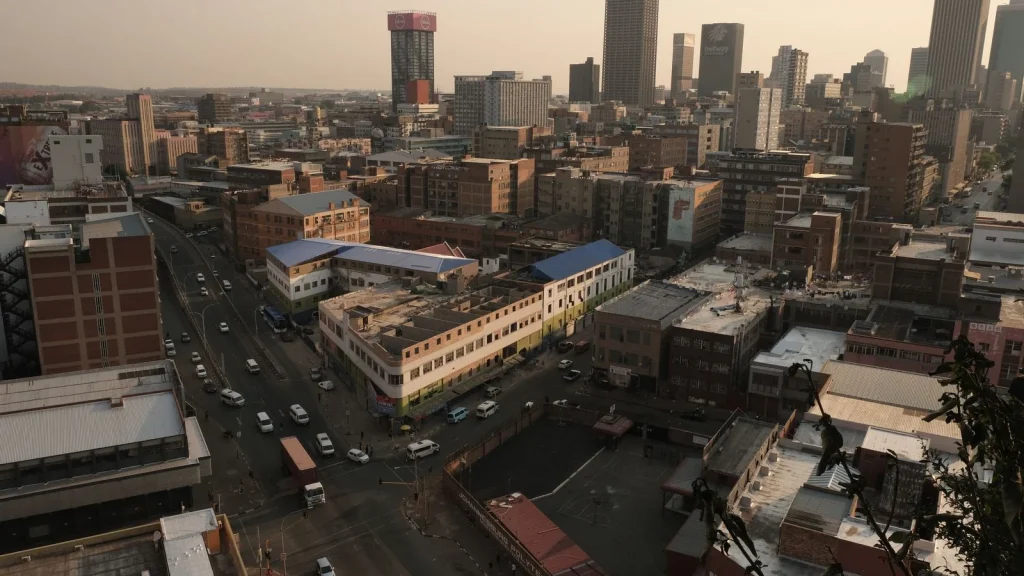 Johannesburg skyline and city buildings in warm evening light