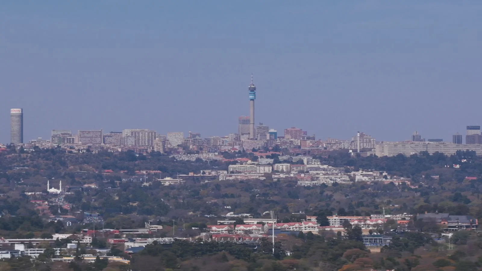 Aerial view of Johannesburg and Sandton beneath a clear sky